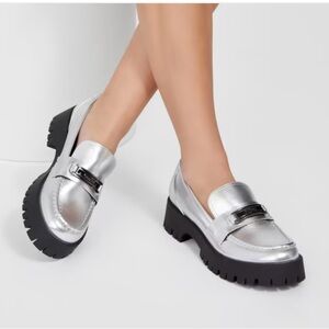 New without box GUESS Faux leather loafer.